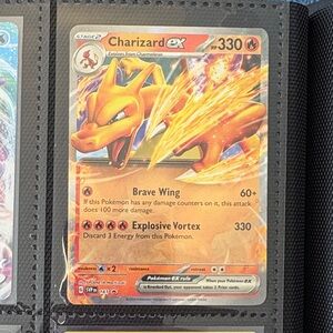 Pokemon Charizard EX Trading Card - Orange and Yellow